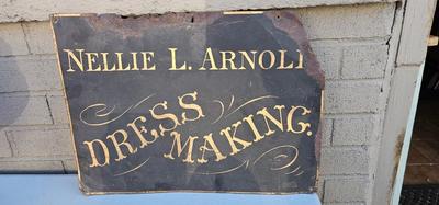 Rusty Shop Sign "Nellie L. Arnold Dress Making"