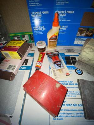 VARIETY OF SANDPAPERS, STEEL WOOL, SANDING BLOCKS, WOOD GLUE AND MORE