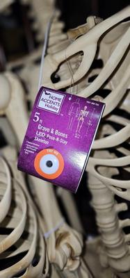 Two complete life size skeletons. New with tags