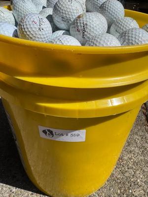 Bucket full of used Golf Balls
