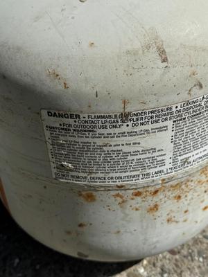 3 used Propane Tanks - 2 are full and 1 is half full
