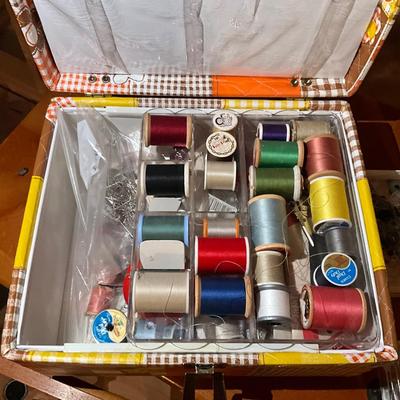 Sale Photo Thumbnail #1074: Includes authentic vintage singer sewing machine
Solid wood sewing table
Table has storage drawers
Comes with accessories box + accessories in drawer
Singer machine does turn on and was tested.