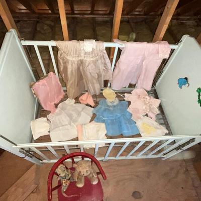 Sale Photo Thumbnail #1084: Includes vintage 1940 - 1950's toddler clothes
Winnie the poo themed vintage baby crib.