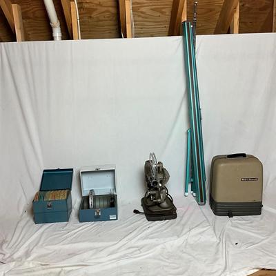 A1444 Vintage Bell & Howell 16mm Projector with Movie Reels & Wall Projector Screen
