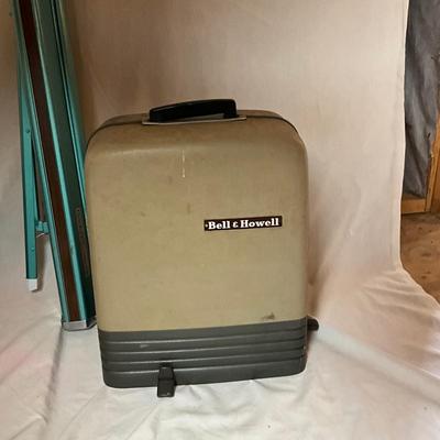 A1444 Vintage Bell & Howell 16mm Projector with Movie Reels & Wall Projector Screen