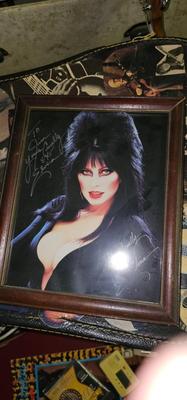 Signed Elvira photo framed 8x 10