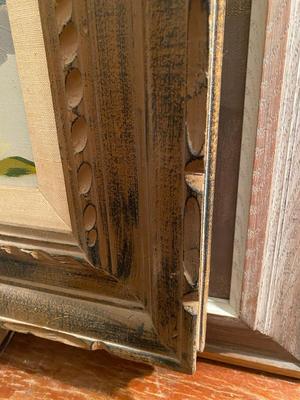 Abstract flowers in carved wood frame