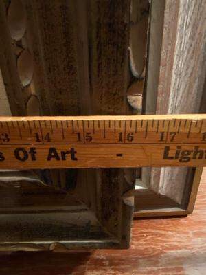 Abstract flowers in carved wood frame