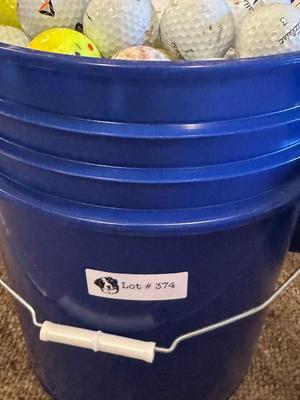 A Bucket full of used Golf Balls