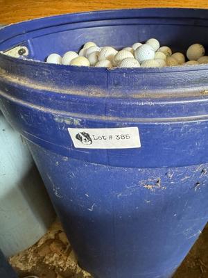 A 32 Gallon Can full of used Golf Balls