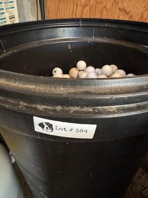 A 32 Gallon Can 3/4 full of used Golf Balls