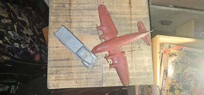 Vintage pressed metal toy truck and Marx airplane