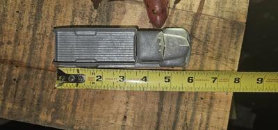 Vintage pressed metal toy truck and Marx airplane