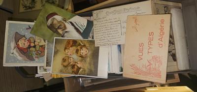 One foot of vintage postcards