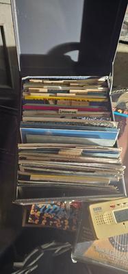Metal box full of vintage Postcards