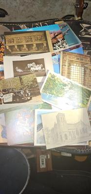 Metal box full of vintage Postcards