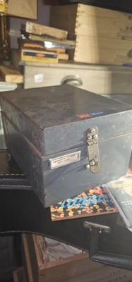 Metal box full of vintage Postcards