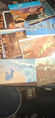 Metal box full of vintage Postcards