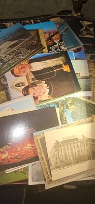 Metal box full of vintage Postcards