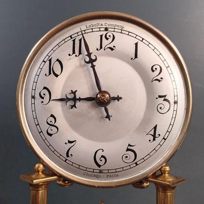 LOT 23: Lebolt & Co. Glass-Case Anniversary Clock w/ Equity Rising Moon Clock