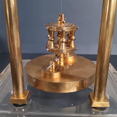 LOT 23: Lebolt & Co. Glass-Case Anniversary Clock w/ Equity Rising Moon Clock