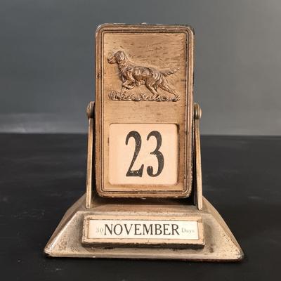 LOT 25: Swiza Sheffield 8-Day Desk Clock, Grammes Perpetual Flip Calendar, Brass Hourglass & Black Starr & Frost 8-Day Desk Clock