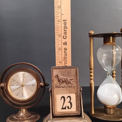 LOT 25: Swiza Sheffield 8-Day Desk Clock, Grammes Perpetual Flip Calendar, Brass Hourglass & Black Starr & Frost 8-Day Desk Clock