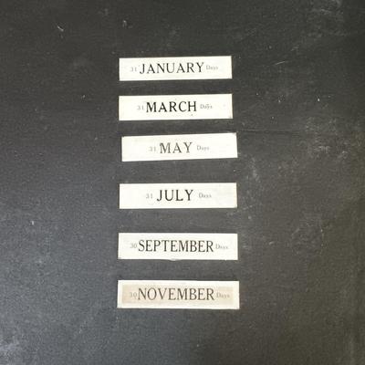 LOT 25: Swiza Sheffield 8-Day Desk Clock, Grammes Perpetual Flip Calendar, Brass Hourglass & Black Starr & Frost 8-Day Desk Clock