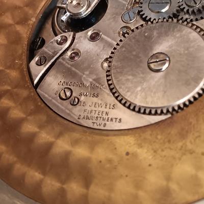 LOT 25: Swiza Sheffield 8-Day Desk Clock, Grammes Perpetual Flip Calendar, Brass Hourglass & Black Starr & Frost 8-Day Desk Clock