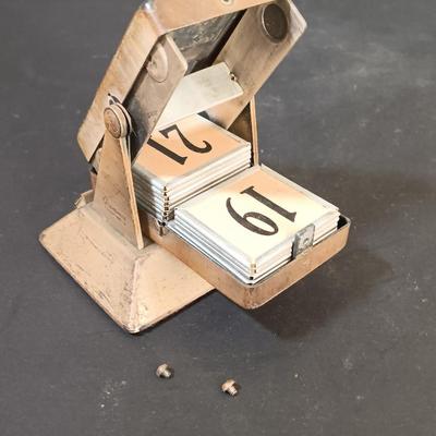 LOT 25: Swiza Sheffield 8-Day Desk Clock, Grammes Perpetual Flip Calendar, Brass Hourglass & Black Starr & Frost 8-Day Desk Clock