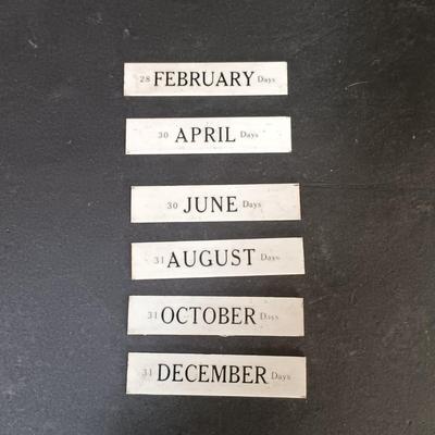 LOT 25: Swiza Sheffield 8-Day Desk Clock, Grammes Perpetual Flip Calendar, Brass Hourglass & Black Starr & Frost 8-Day Desk Clock