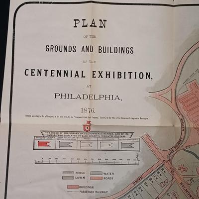 LOT 195: 1876 Philadelphia Centennial Exhibition Visitors Guide w/ Brass Eagle Flag Topper, Bailey Banks & Biddle Co. Miniature...