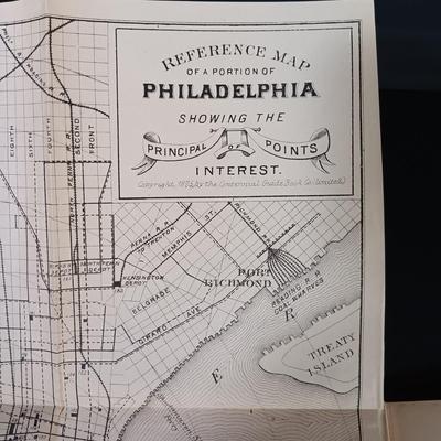 LOT 195: 1876 Philadelphia Centennial Exhibition Visitors Guide w/ Brass Eagle Flag Topper, Bailey Banks & Biddle Co. Miniature...