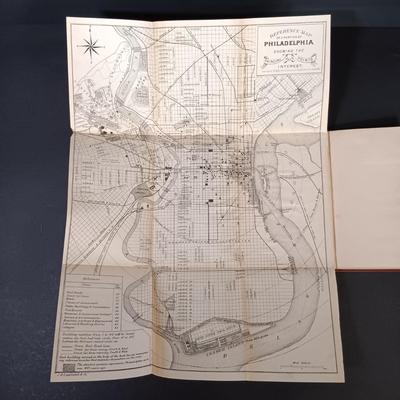 LOT 195: 1876 Philadelphia Centennial Exhibition Visitors Guide w/ Brass Eagle Flag Topper, Bailey Banks & Biddle Co. Miniature...