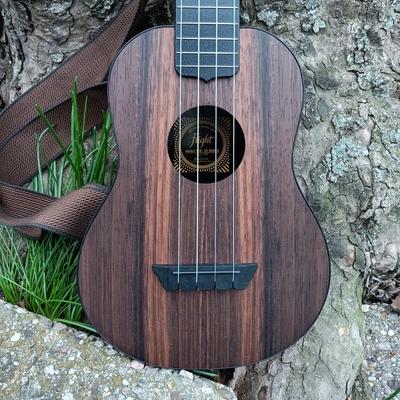 LOT 202: Flight Model TUC-55 Amara Concert Travel Ukulele