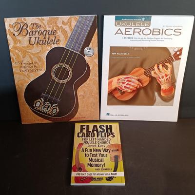 LOT 205: Vintage Franz Electric Metronome with Musical Instrument Related Books and Accessories