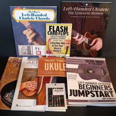 LOT 205: Vintage Franz Electric Metronome with Musical Instrument Related Books and Accessories