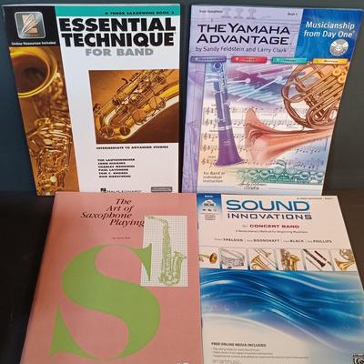 LOT 205: Vintage Franz Electric Metronome with Musical Instrument Related Books and Accessories