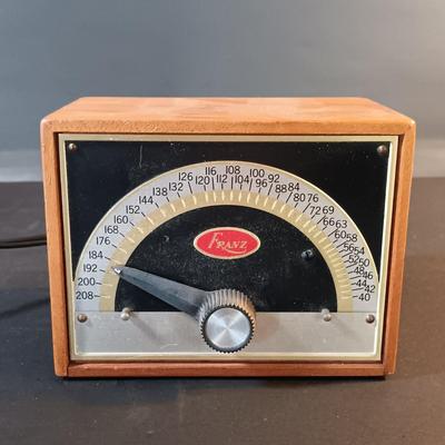 LOT 205: Vintage Franz Electric Metronome with Musical Instrument Related Books and Accessories
