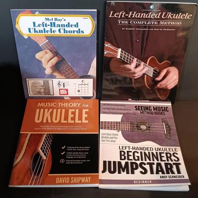 LOT 205: Vintage Franz Electric Metronome with Musical Instrument Related Books and Accessories