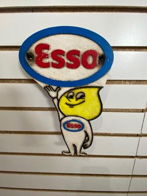VINTAGE CAST IRON "ESSO" GUARANTEED OIL SIGN