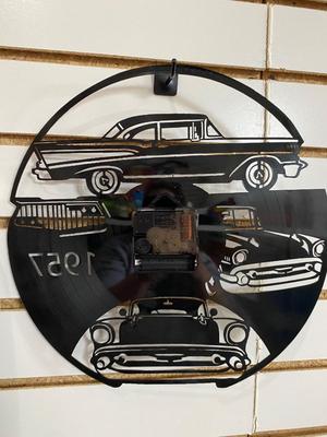 TIN JUKE BOX SIGN AND AN ACTUAL RECORD ALBUM CLOCK