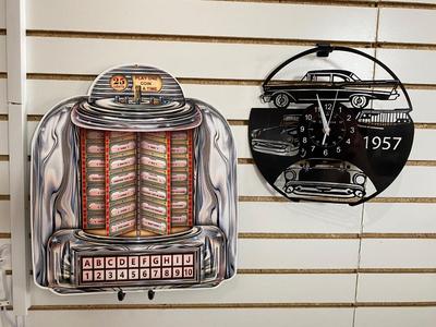 TIN JUKE BOX SIGN AND AN ACTUAL RECORD ALBUM CLOCK