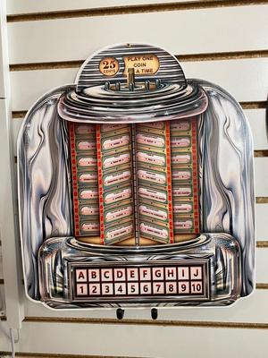 TIN JUKE BOX SIGN AND AN ACTUAL RECORD ALBUM CLOCK