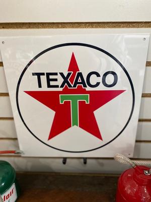 TIN TEXACO SIGN AND OIL CAN, ALONG WITH A HAND STRIPED OIL CAN.