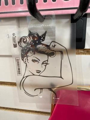 ROSIE THE RIVETER KEYCHAIN ALONG WITH HER DISTANT RELATIVES WINDOW STICKER, TIN FLAMINGO ROAD SIGN, AND MINI BLUETOOTH RADIO