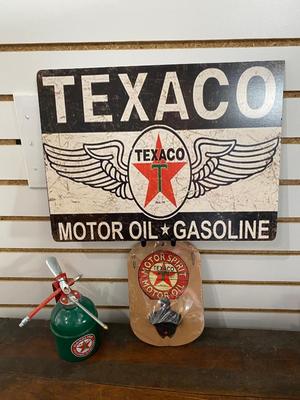 TEXACO ADVERTISING ITEMS, PLASTIC SIGN, OIL CAN AND TIN AND CAST IRON BOTTLE OPENER