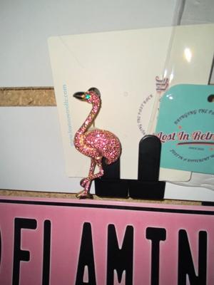 FLAMINGO ROAD SIGN AND A TISSUE BOX HOLDER