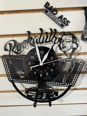 SOME “BAD ASS” WALL DECOR, ACTUAL RECORD ALBUM CLOCK AND A PISTON MASCOT