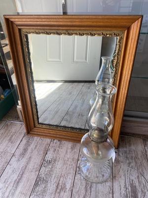 WALL MIRROR AND OIL LAMP